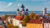 Estonia -- Stock Photo: Toompea hill with tower Pikk Hermann and Russian Orthodox Alexander Nevsky Cathedral, view from the tower of St. Olaf church, Tallinn, Estonia Image ID:331780052 Copyright: kavalenkava volha